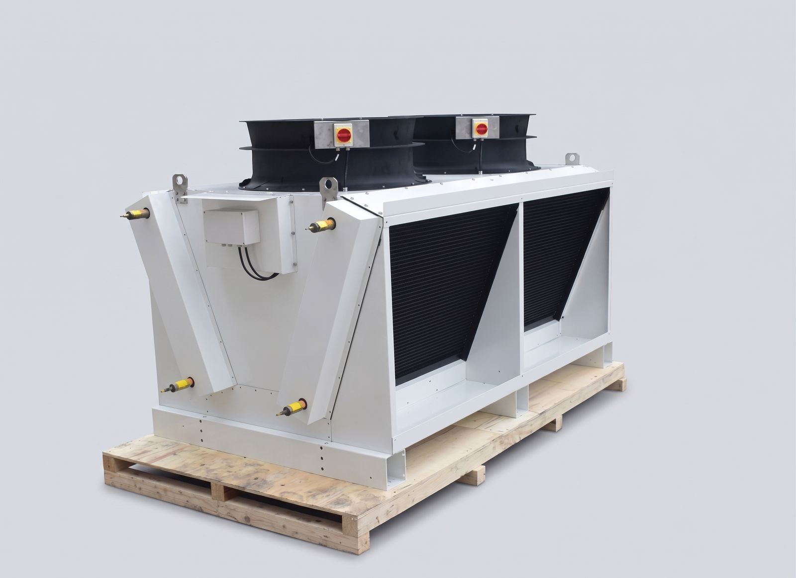 Compact V-bank gas cooler with two axial fans, local isolator switches and capped connections.