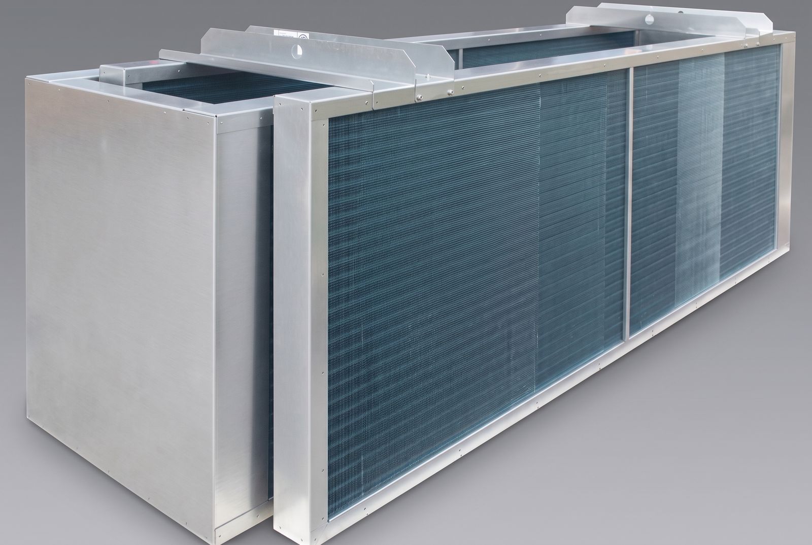Two stainless cased coil assemblies with coated aluminum fin blocks, brushed stainless casing and mounting rails, built without fans.