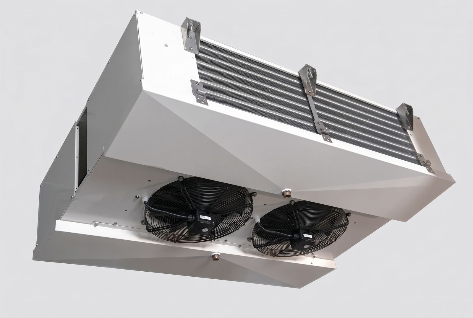 Dual discharge unit cooler seen from below, twin axial fans firing downward and an aluminum fin block on the top face.